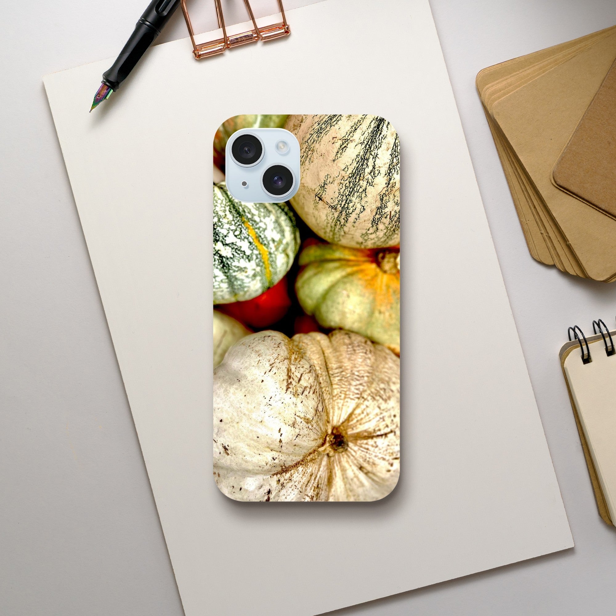 Rustic autumn farmhouse phone case with fall harvest pumpkins and gourds for iPhone 15 Plus, made from printed material.