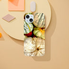 Print material pumpkin and gourd phone case featuring rustic autumn farmhouse design for iPhone 15 Plus.