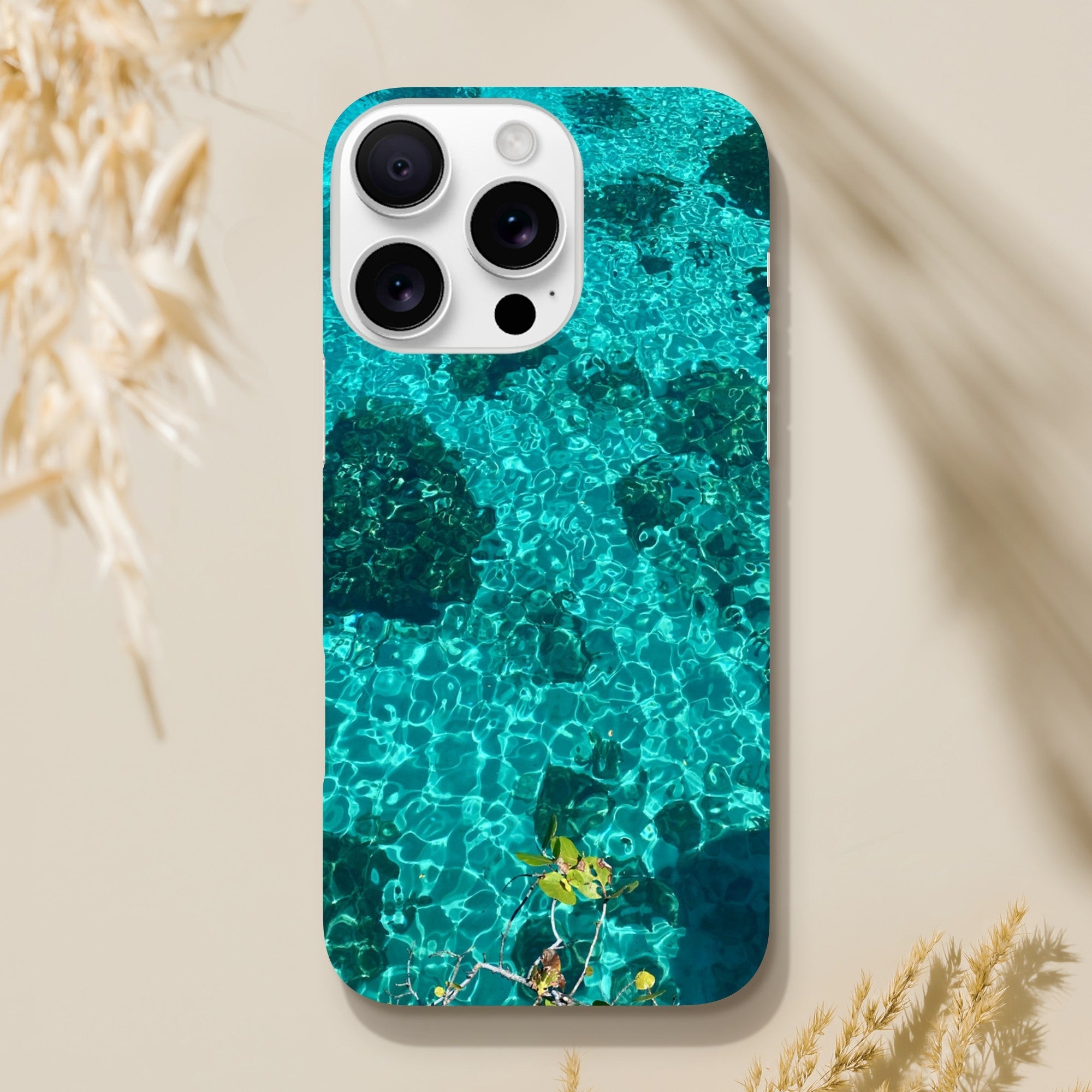 Slim blue iPhone 16 Pro Max cover with beach and artistic print, durable and trendy phone case, perfect gift for her.