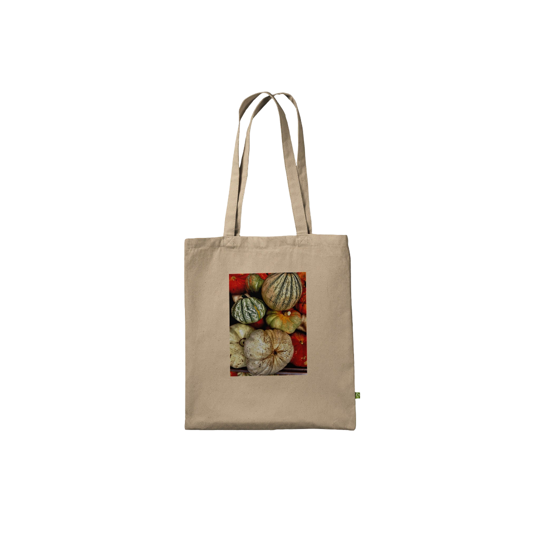 Rustic Autumn Harvest tote bag with pumpkin and gourd print, made from natural print material, farmhouse market style.