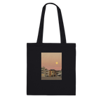 Eco-friendly cotton beach tote bag with a colorful harvest moon print, ideal for shopping and casual outings.
