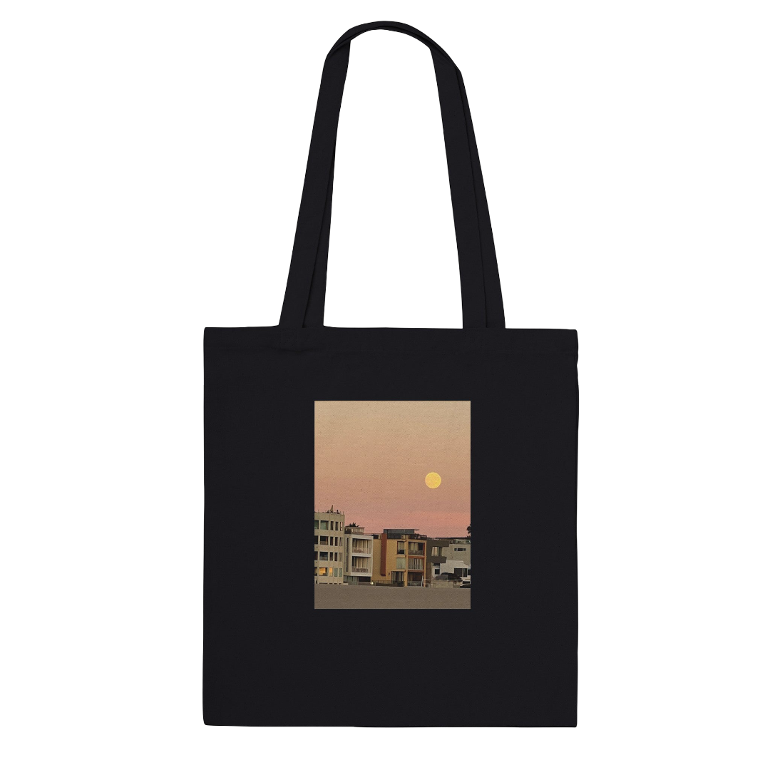 Eco-friendly cotton beach tote bag with a colorful harvest moon print, ideal for shopping and casual outings.