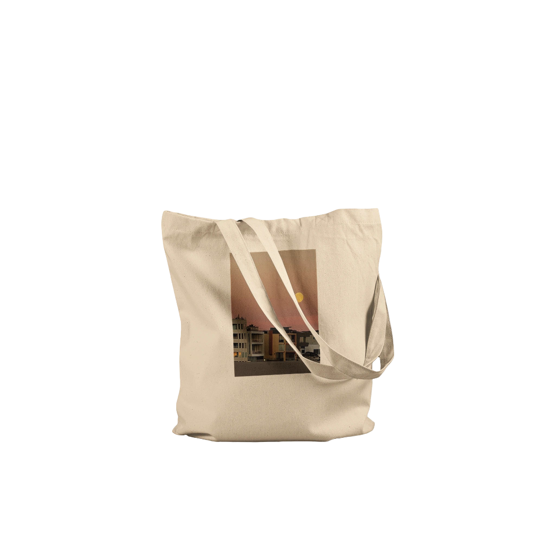 Natural cotton beach tote bag with colorful vegetable print, eco-friendly design, ideal for shopping and beach trips.
