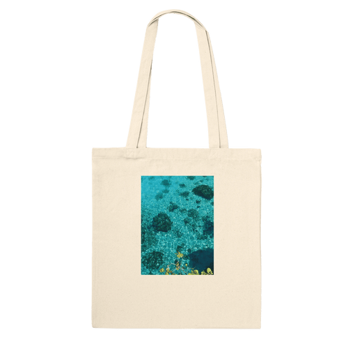 Eco-friendly cotton tote bag with long handles featuring a Chic Caribbean Magic print, ideal for eco-conscious fashion enthusiasts.