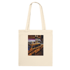 Eco-friendly cotton tote bag featuring a NYC taxi cab holiday magic print, perfect for carrying essentials in style.