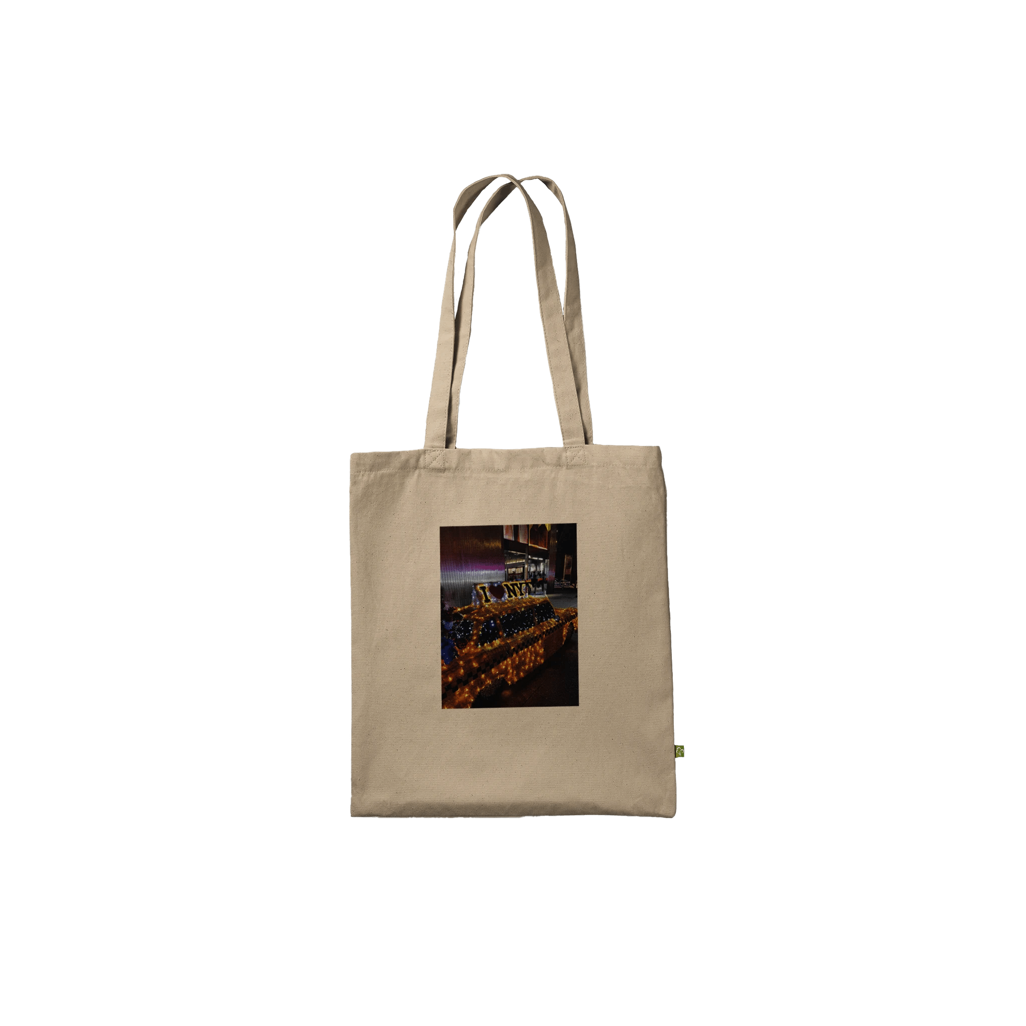 Eco-friendly cotton tote bag featuring a NYC taxi cab holiday magic print, stylish and durable for everyday use.