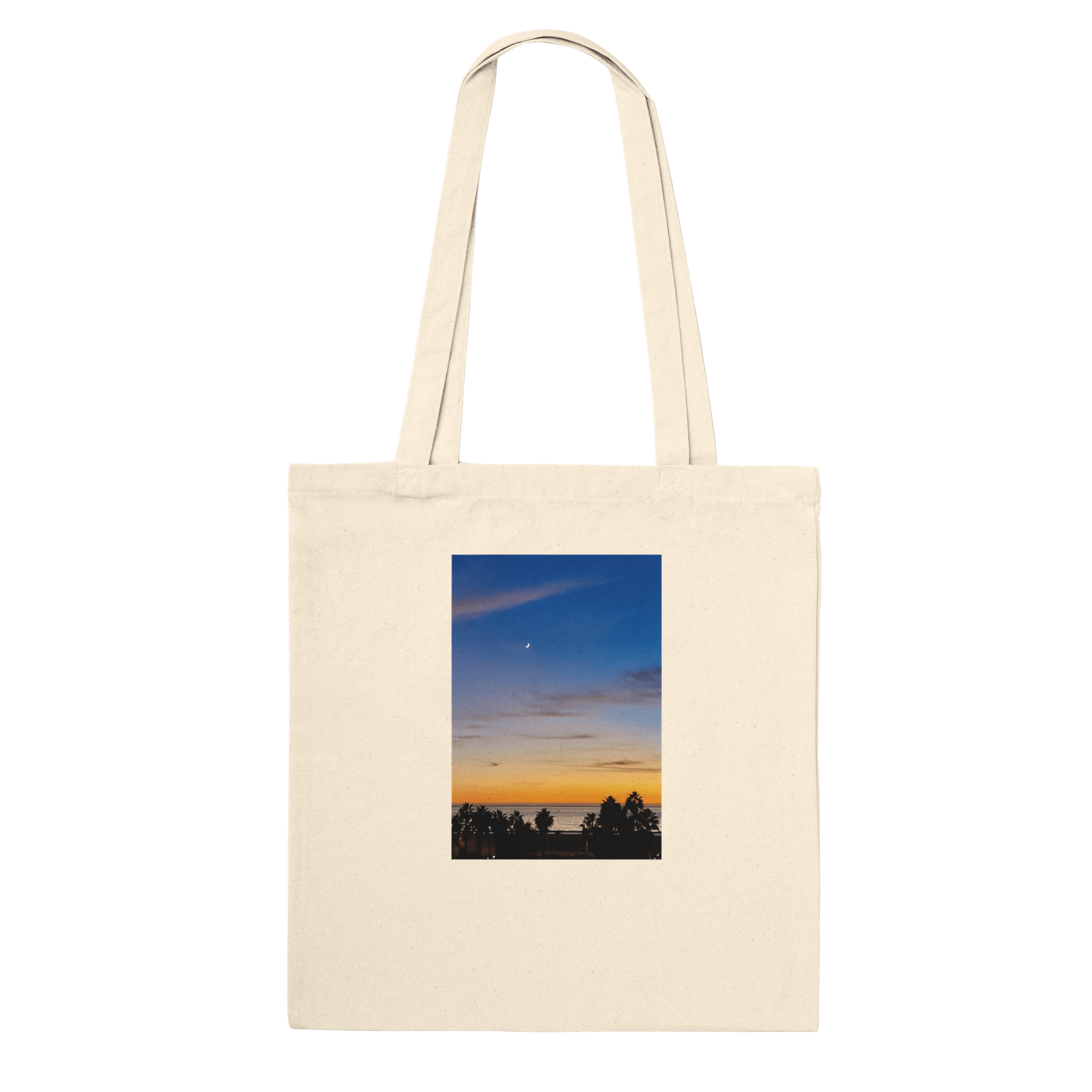 Eco-friendly California Sunset tote bag made of 100% cotton with a vibrant sunset print, showcasing natural and eco-conscious design.