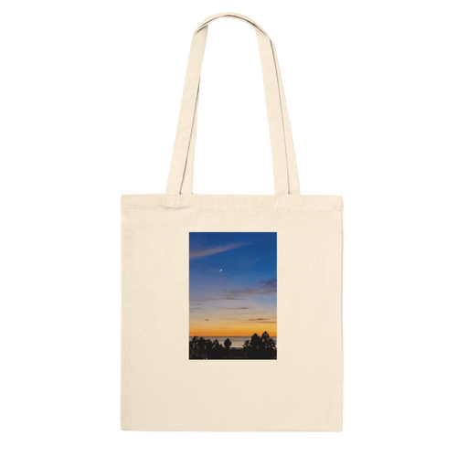 Natural cotton tote bag featuring a California sunset design with vibrant colors and West Coast-inspired print.