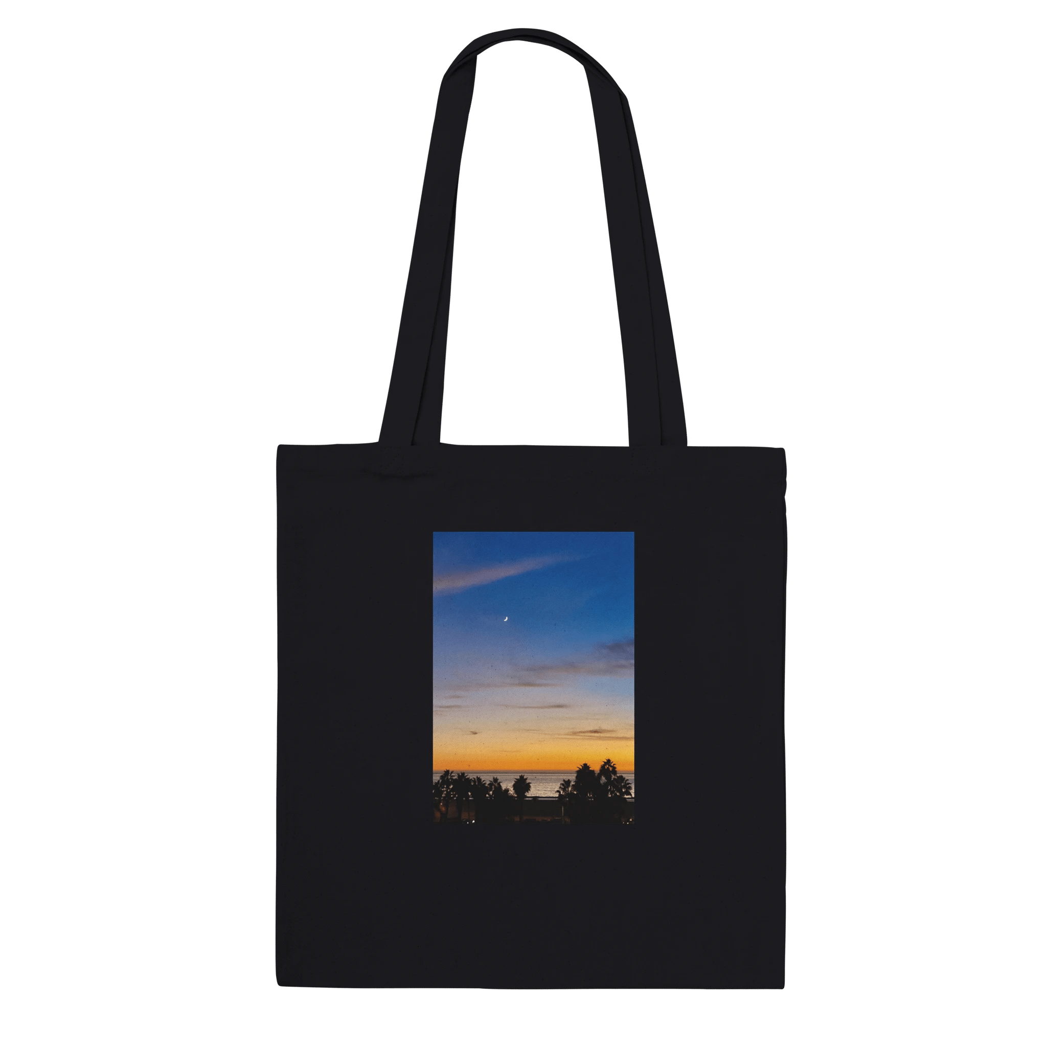 Eco-friendly California Sunset tote bag made of 100% cotton with vibrant sunset print, perfect for everyday use.