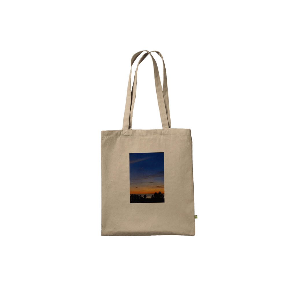 Eco-friendly California Sunset tote bag with vibrant print design made from 100% cotton, showcasing a stunning sunset scene.