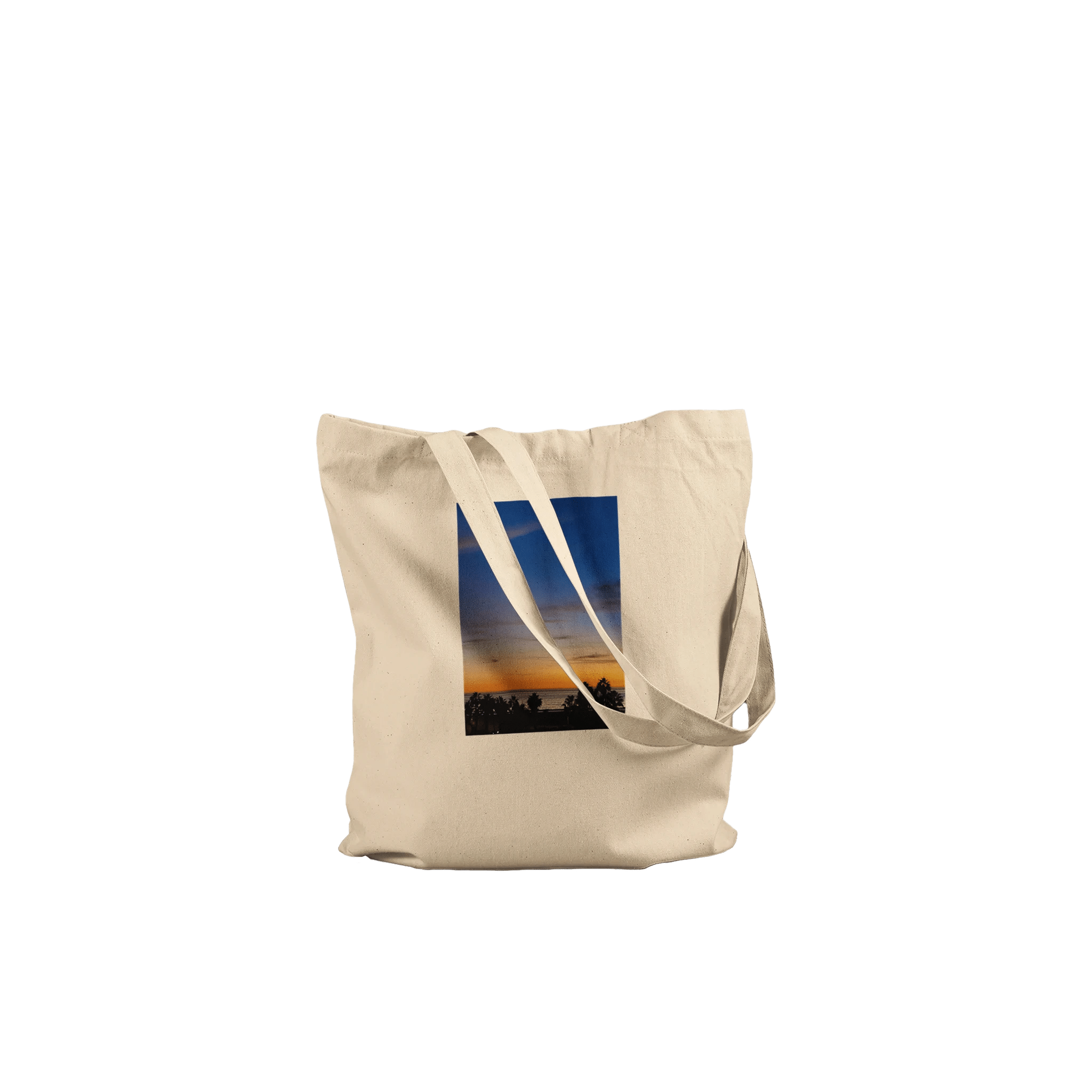 Eco-friendly California Sunset tote bag with vibrant sunset print, made from 100% cotton, showcasing natural, colorful design.