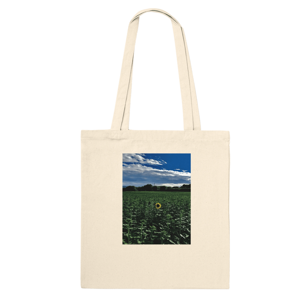 Stylish sunflower field print on eco-friendly tote bag made of premium material, featuring natural floral design.
