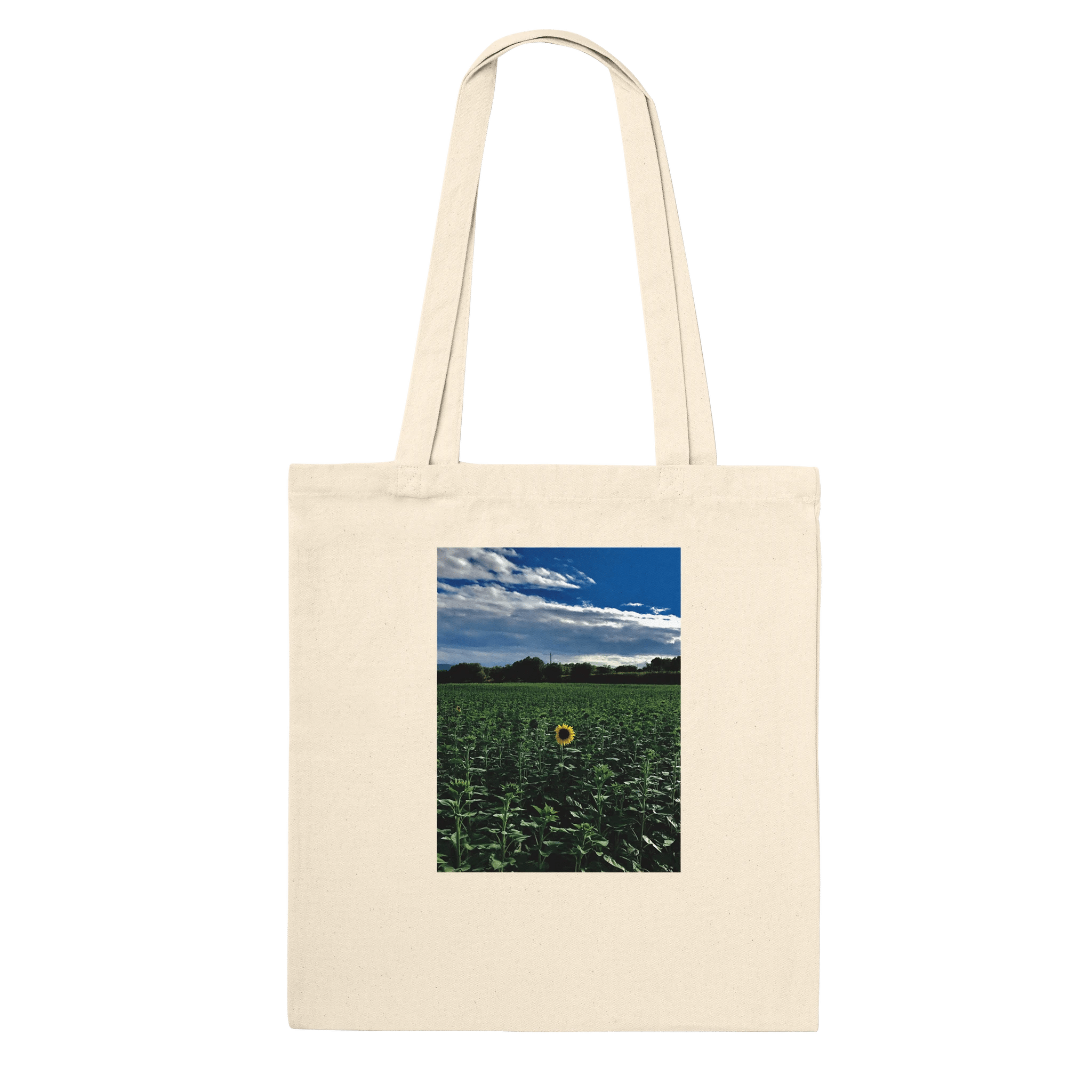 Stylish sunflower field print on eco-friendly tote bag made of premium material, featuring natural floral design.