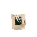 Stylish sunflower field print on eco-friendly tote bag made from premium natural material, designed for chic, eco-conscious fashion.