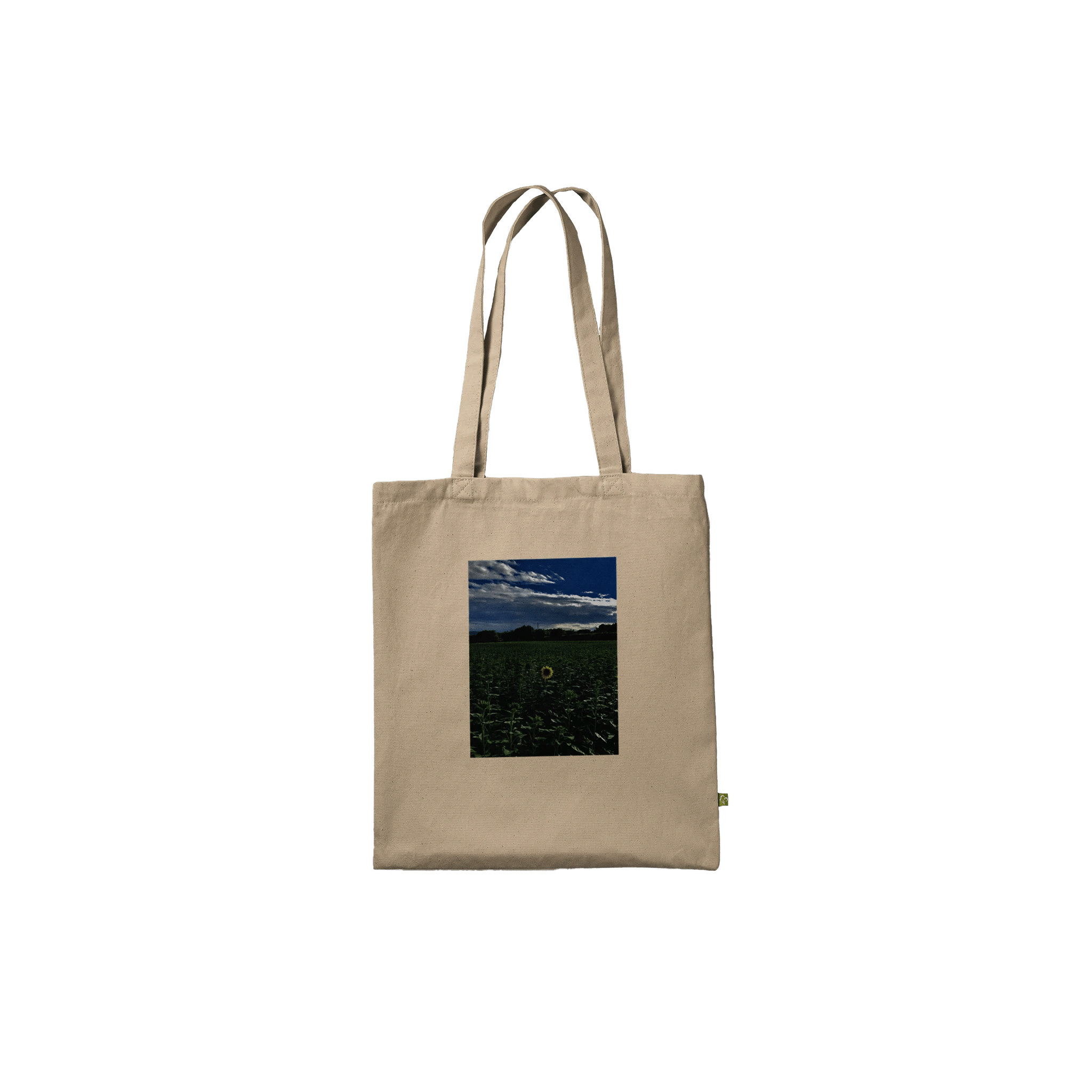 Stylish sunflower field print on eco-friendly tote bag made of premium material, showcasing a natural, chic design.