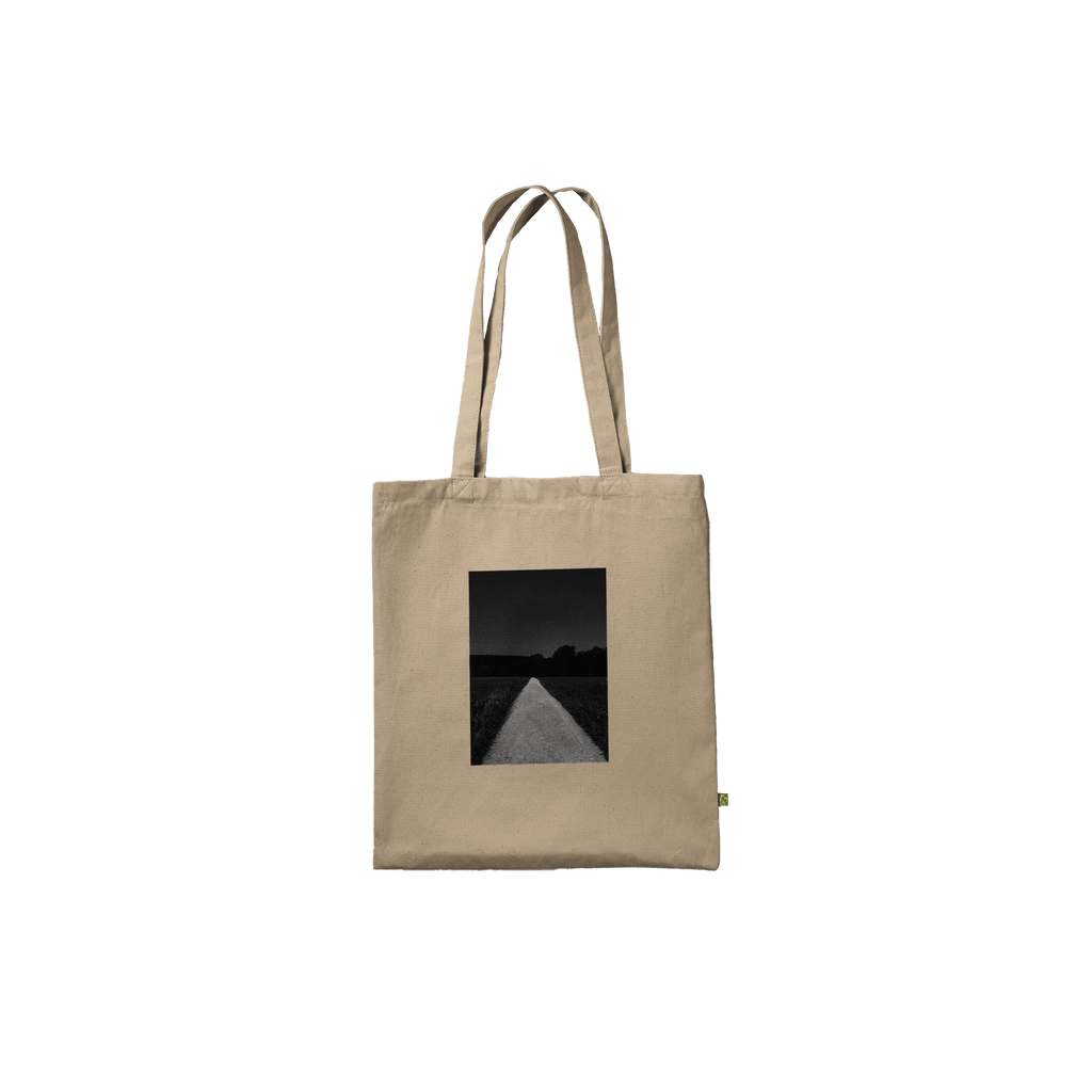 Eco-friendly cotton tote bag featuring a summer road in the fields print, showcasing a timeless chic design.