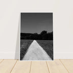 Black and white framed poster of a summer road scene on semi-glossy paper, part of the Travel Collection Studio Edition.